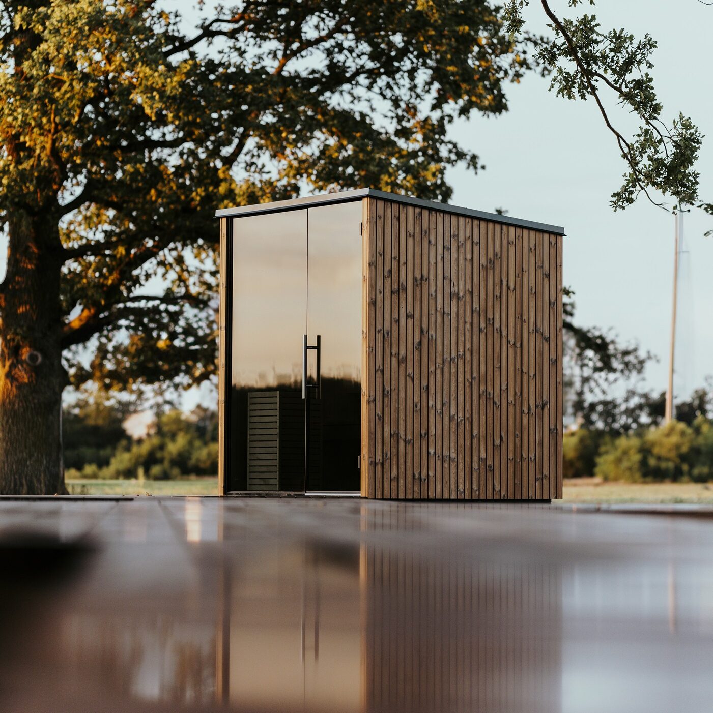 Sauna d'extérieur PURE à façade entièrement vitrée